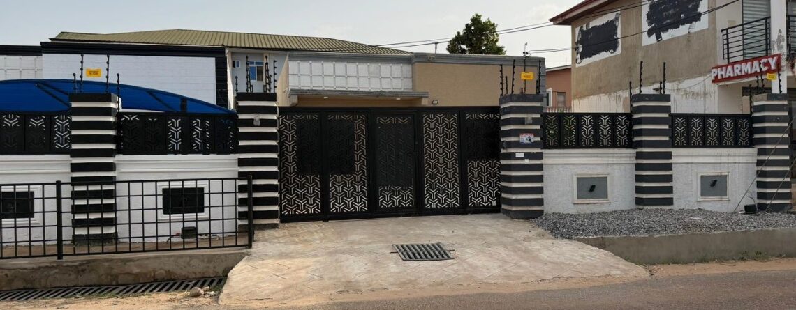Exterior gated entrance of Divine Space Spintex