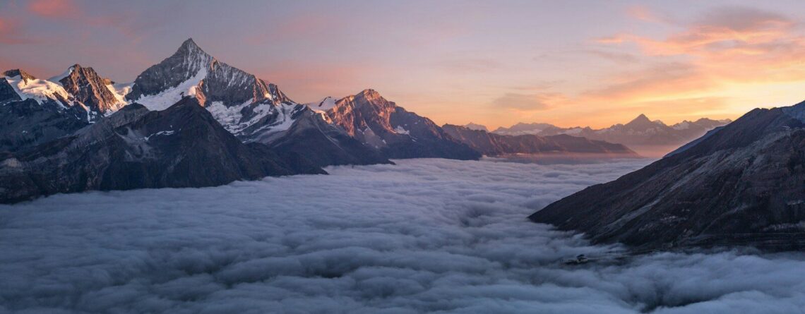aerial photo of foggy mountains