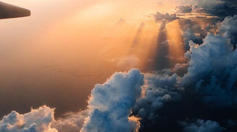 airplane on sky during golden hour